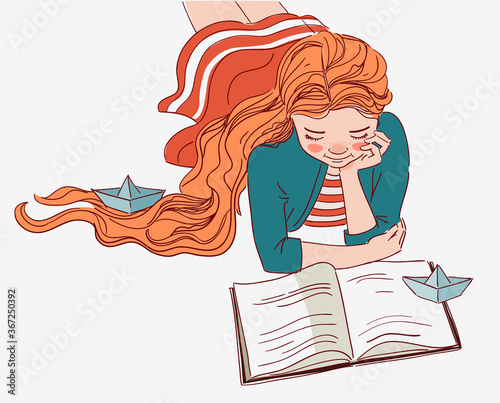 Cute girl reading a book