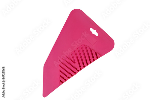 Pink plastic spatula for wallpapering isolated on white background