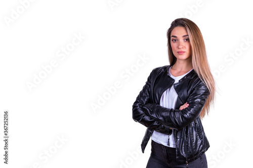 A girl in a leather jacket and a white t shirt isolated on a white background