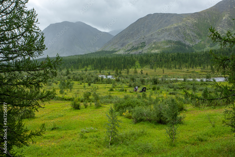 Amazing mountain landscape with colorful sky. Travel and hiking concept. Mountain landscape Subpolar Urals.