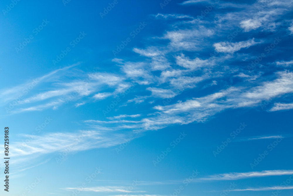 Fluffy white cloud flying on blue sky background Fluffy white cloud flying on blue sky background