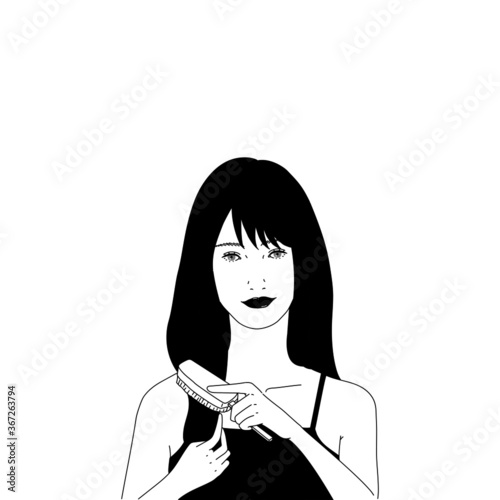 ヘアケア　ヘアブラシでかみをとかす女性