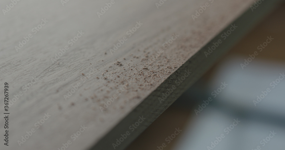 untreated walnut board closeup in workshop untreated walnut board closeup in workshop