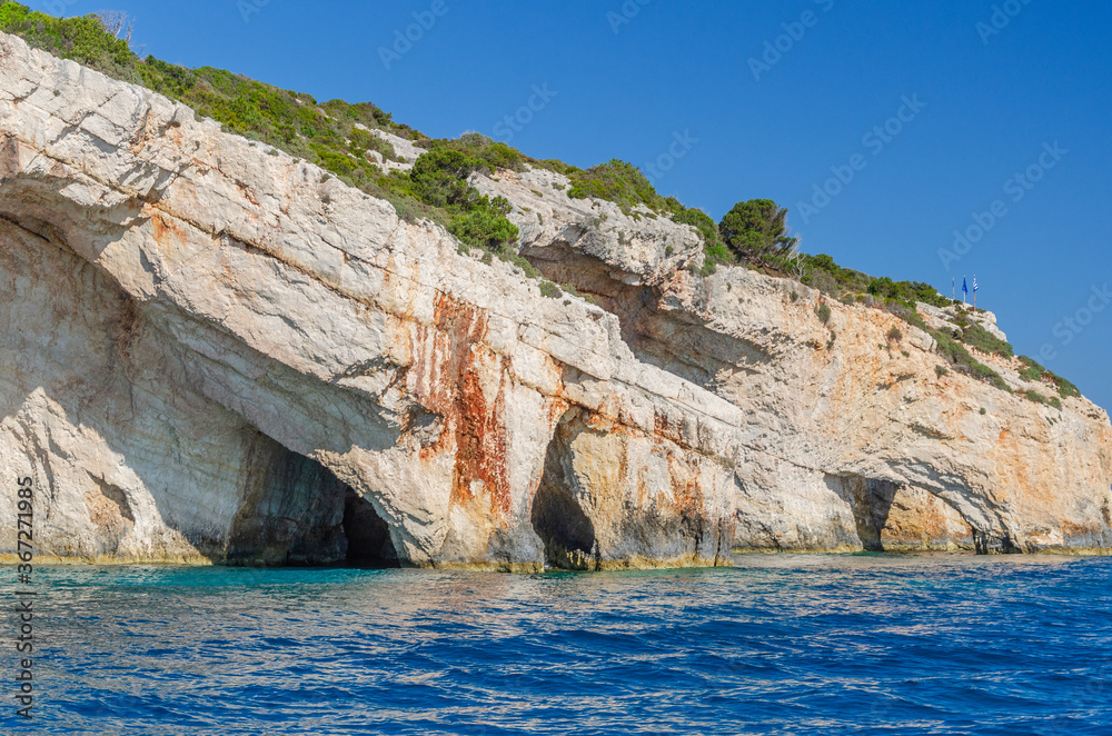 Gorgeous azure waters of blue caves on north east coast of Zakynthos island, Greece