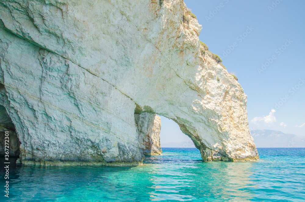 Gorgeous azure waters of blue caves on north east coast of Zakynthos island, Greece Gorgeous azure waters of blue caves on north east coast of Zakynthos island, Greece