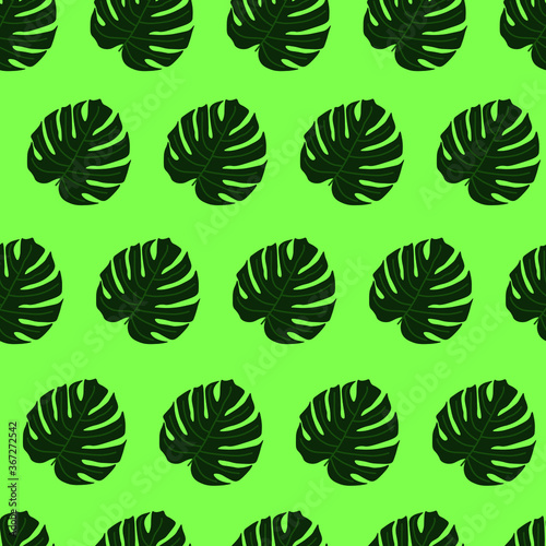 seamless pattern with fern leaves on green background 