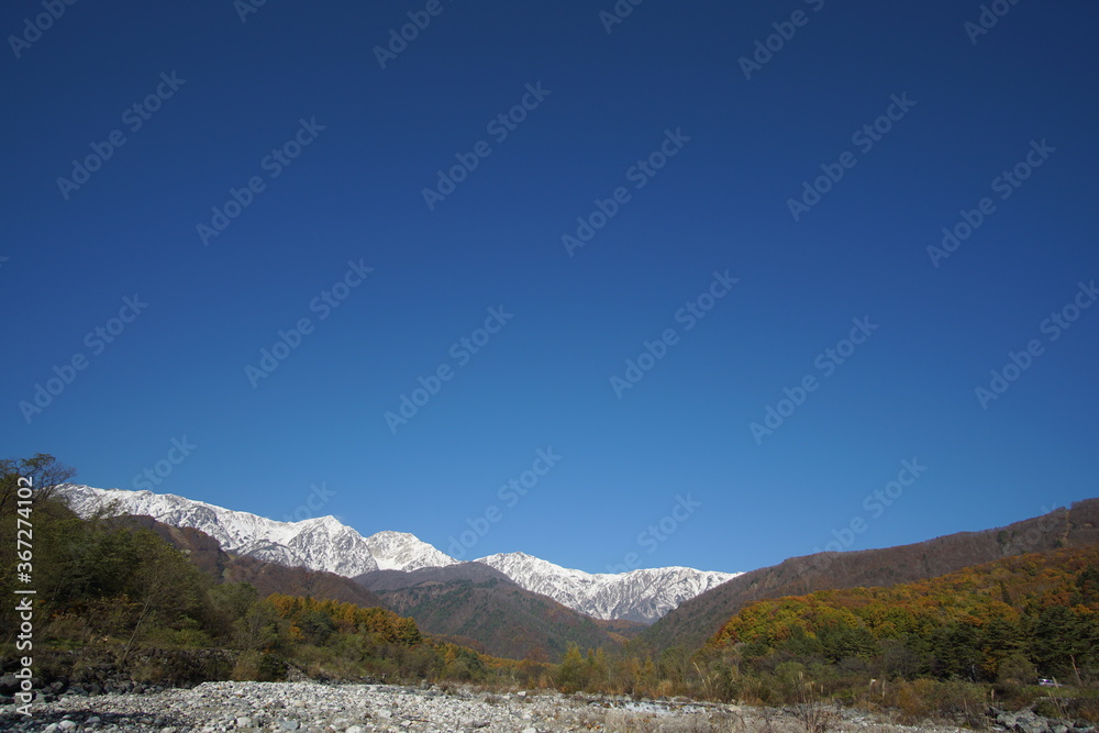 typical mountain landscape of Japanese alps in Hakuba at early Autumn