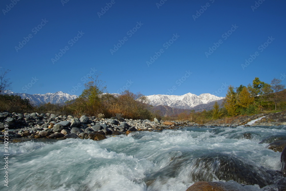 typical mountain landscape of Japanese alps in Hakuba at early Autumn