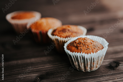 homemade cakes, cupcakes with different fillings on a dark background