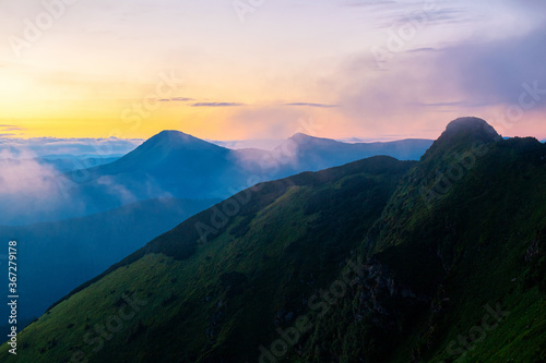 Colorful sunrise landscape in the mountains, scenic wild nature panorama at the dawn, Carpathians © O.Farion