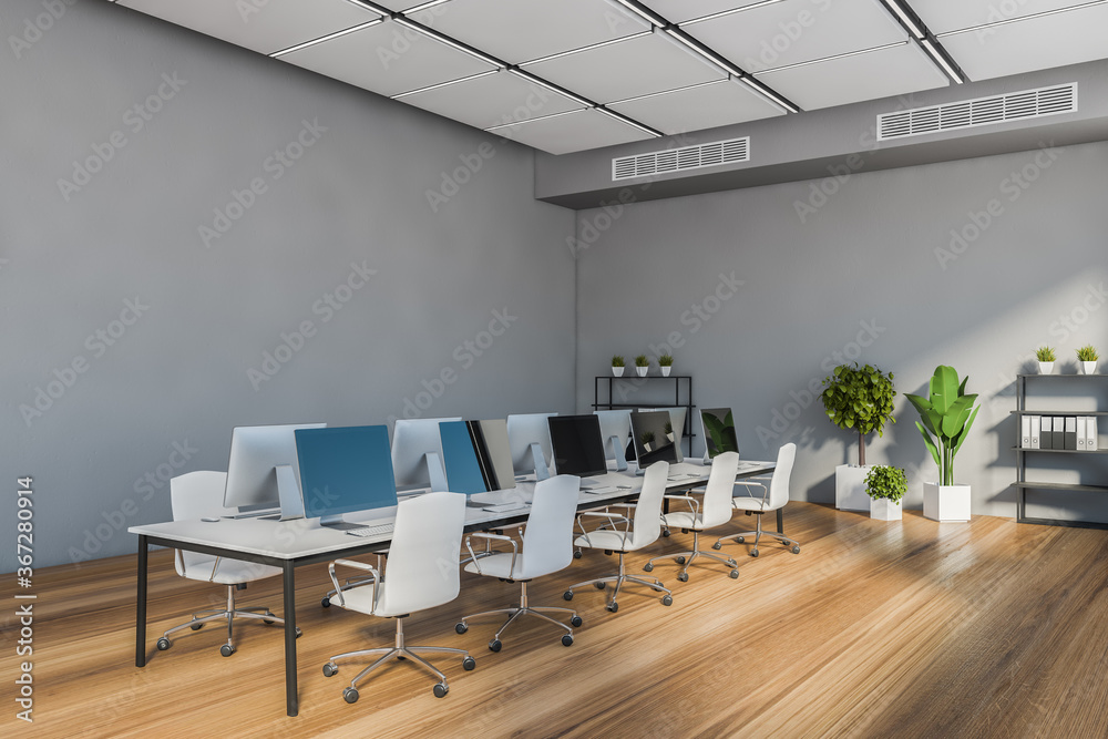 Fototapeta premium Modern grey open space office corner