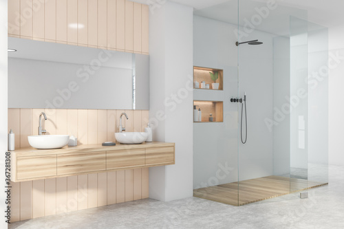 Grey and beige bathroom corner  sink and shower