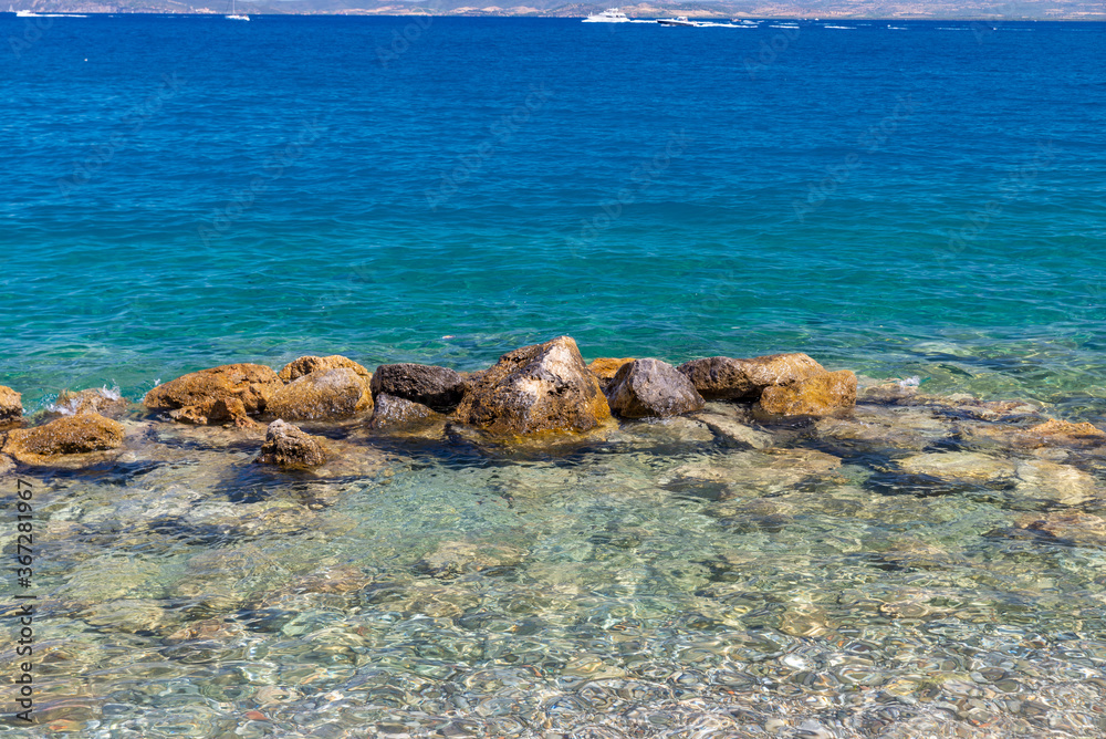 rocks in the middle of the sea in porto santo stefano