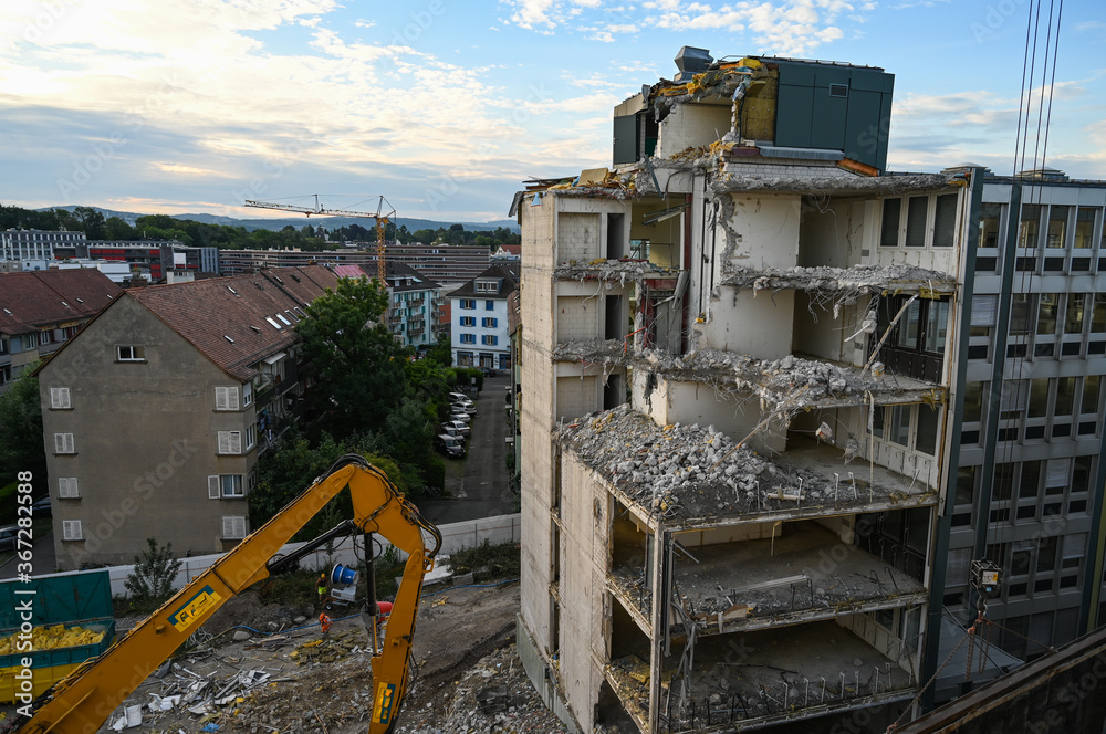 Aerial view of demolition building with crane