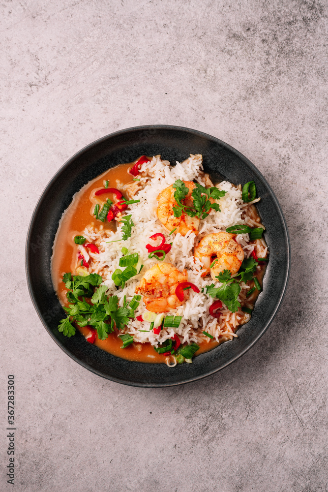 Shrimp with basmati rice and spicy bisque with coconut milk Shrimp with basmati rice and spicy bisque with coconut milk