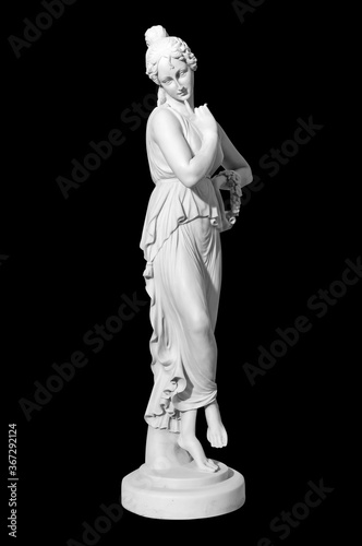 statue of a naked woman on a black background