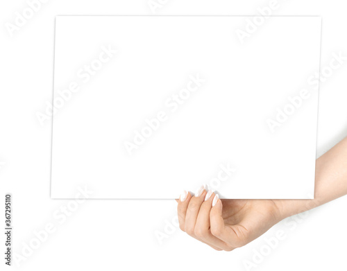 Holding card. Hand holding blank business paper card isolated on white background. Layout and mockup for design, place for text, copy space.