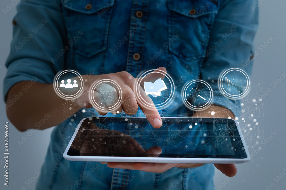 © Angelov - Businessman focused on case study. study online, e learning © Angelov - Businessman focused on case study. study online, e learning