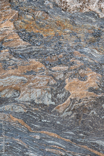 Fein gemaserter gemusterter grauer, roter Fels mit Struktur