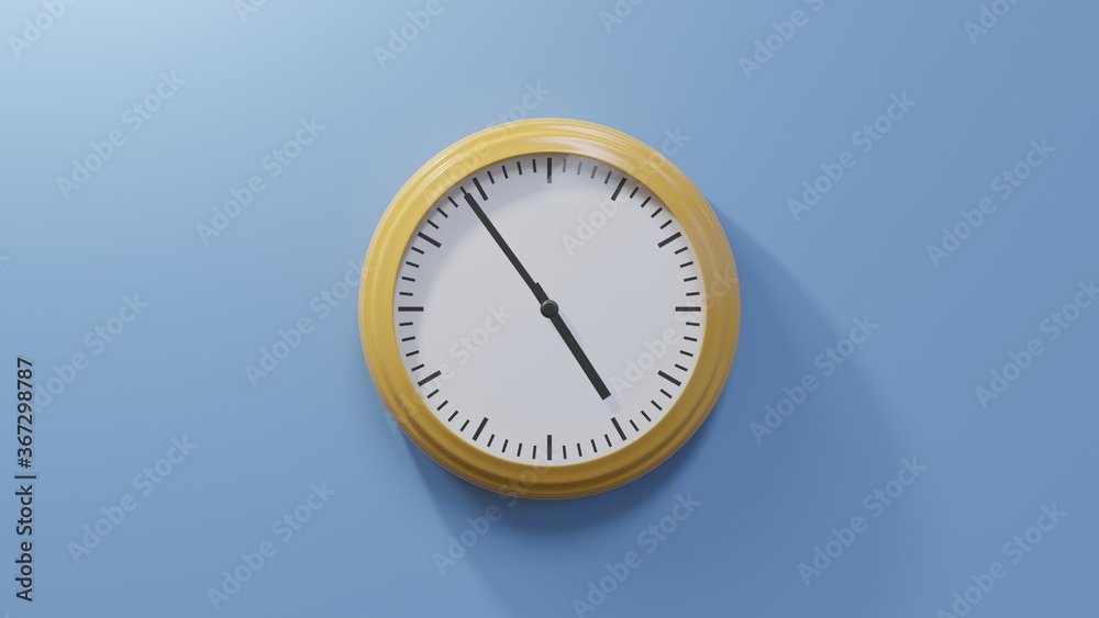 Glossy orange clock on a blue wall at fifty-four past four. Time is 04:54 or 16:54 Glossy orange clock on a blue wall at fifty-four past four. Time is 04:54 or 16:54
