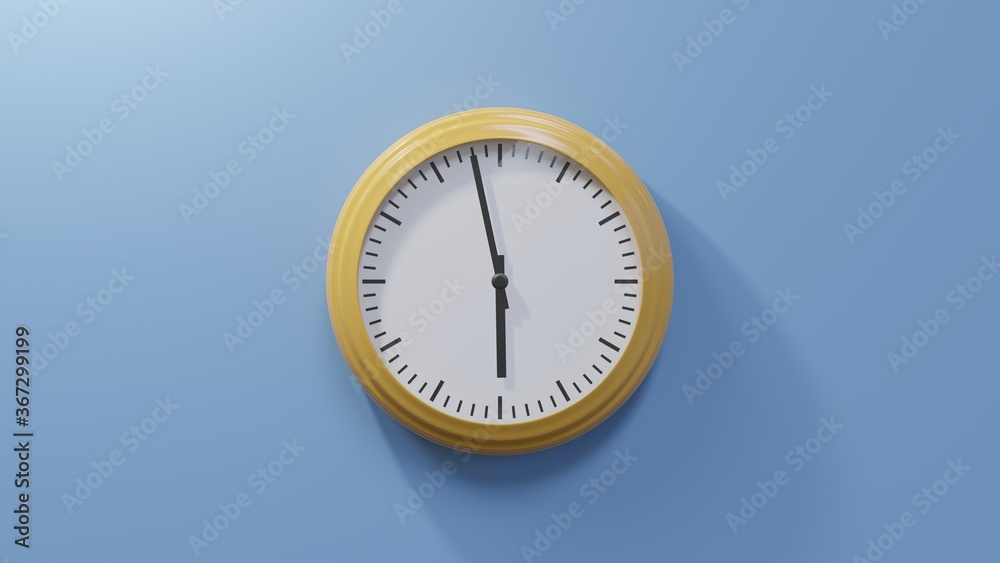 Glossy orange clock on a blue wall at fifty-eight past five. Time is 05:58 or 17:58 Glossy orange clock on a blue wall at fifty-eight past five. Time is 05:58 or 17:58