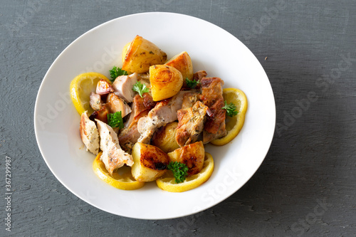 Greek Style Roasted Chicken, Potatoes, Parsely and Lemon