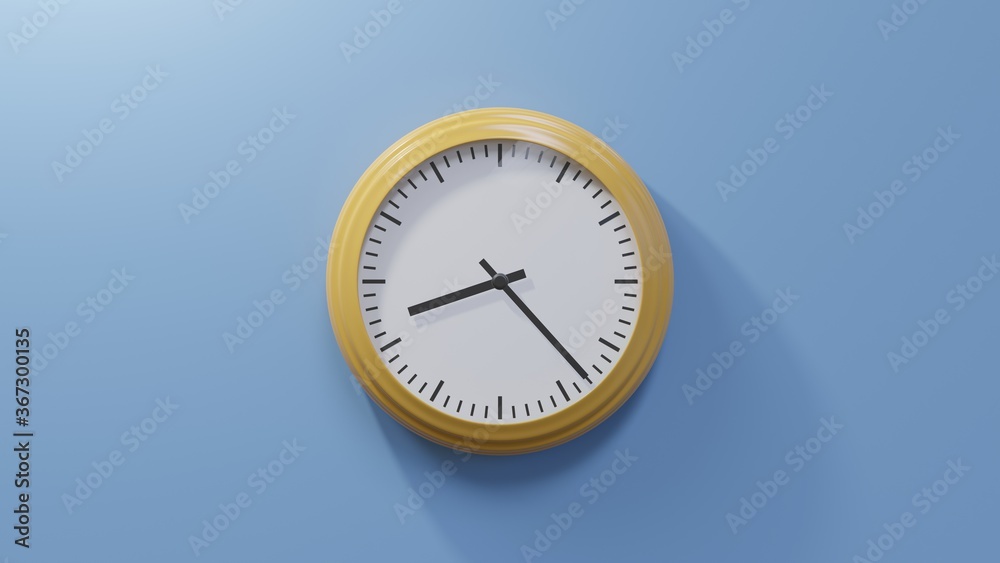 Glossy orange clock on a blue wall at twenty-three past eight. Time is 08:23 or 20:23 Glossy orange clock on a blue wall at twenty-three past eight. Time is 08:23 or 20:23