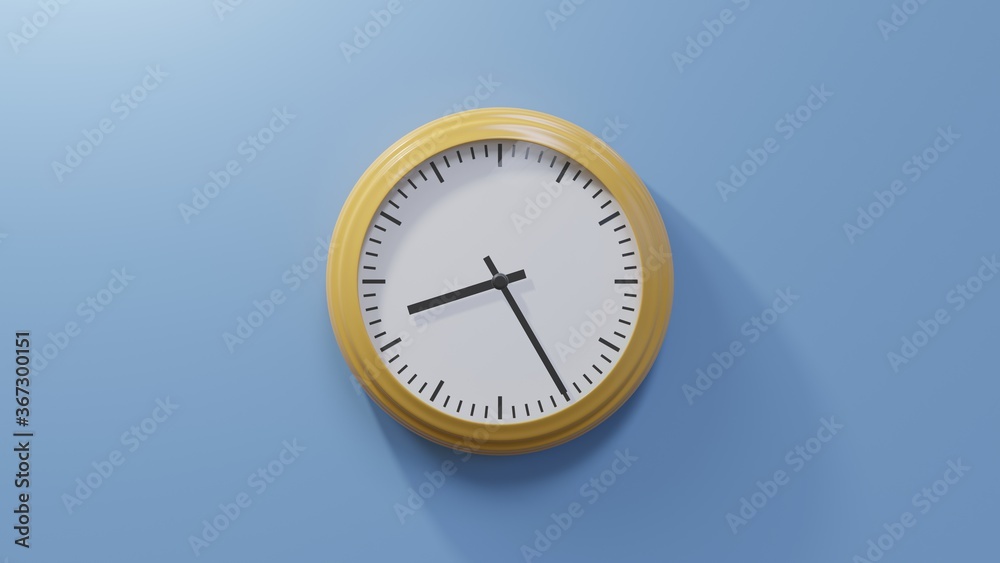 Glossy orange clock on a blue wall at twenty-five past eight. Time is 08:25 or 20:25 Glossy orange clock on a blue wall at twenty-five past eight. Time is 08:25 or 20:25