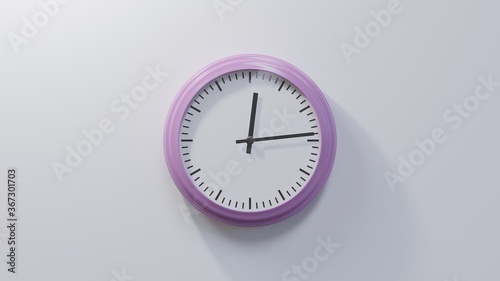 Glossy pink clock on a white wall at fourteen past twelve. Time is 00:14 or 12:14 photo