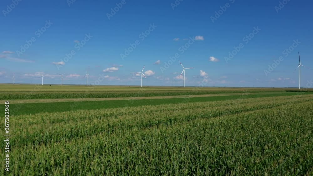 Aerial view of wind turbines on modern wind farm from drone pov Aerial view of wind turbines on modern wind farm from drone pov