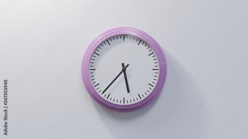 Glossy pink clock on a white wall at thirty-seven past five. Time is 05:37 or 17:37 Glossy pink clock on a white wall at thirty-seven past five. Time is 05:37 or 17:37