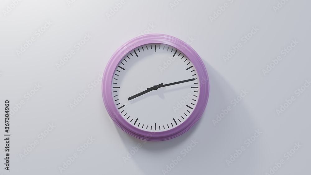 Glossy pink clock on a white wall at thirteen past eight. Time is 08:13 or 20:13