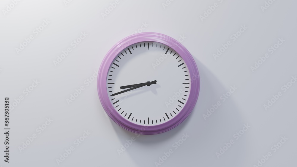 Glossy pink clock on a white wall at forty-two past eight. Time is 08:42 or 20:42
