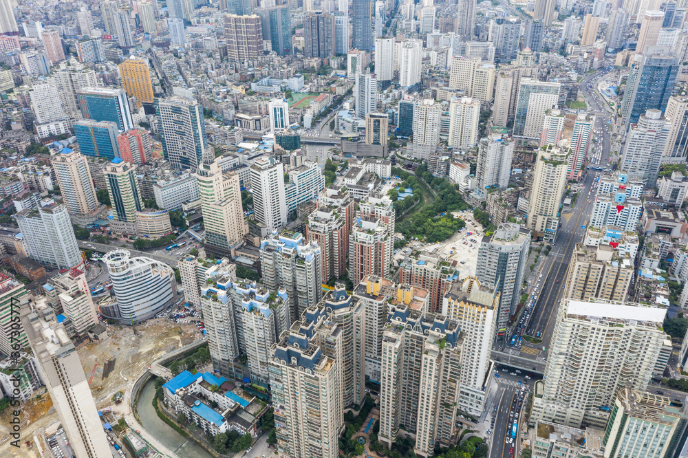 Aerial view of modern city and mountains