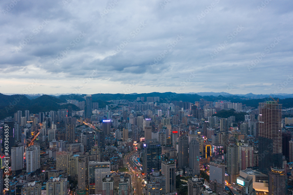 Aerial view of modern city and mountains