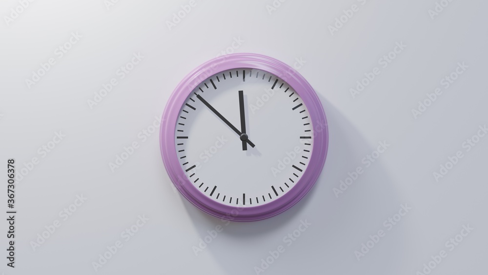 Glossy pink clock on a white wall at fifty-two past eleven. Time is 11:52 or 23:52 Glossy pink clock on a white wall at fifty-two past eleven. Time is 11:52 or 23:52