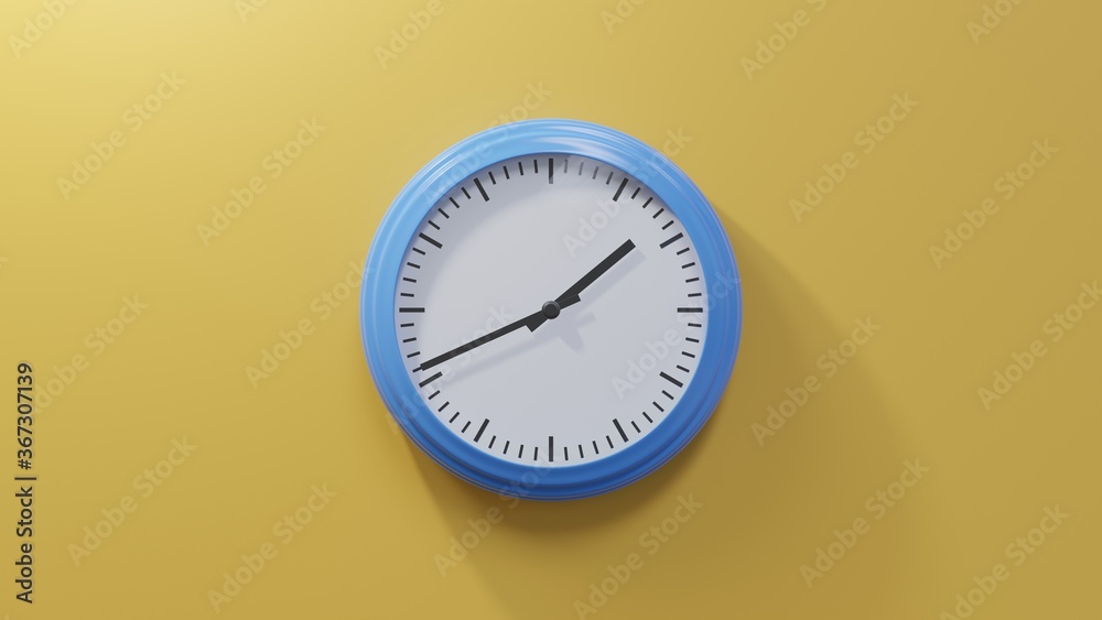 Glossy blue clock on a orange wall at forty-one past one. Time is 01:41 or 13:41 Glossy blue clock on a orange wall at forty-one past one. Time is 01:41 or 13:41