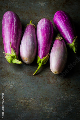 Wallpaper Mural Fairy Tale Eggplants on a dark surface Torontodigital.ca