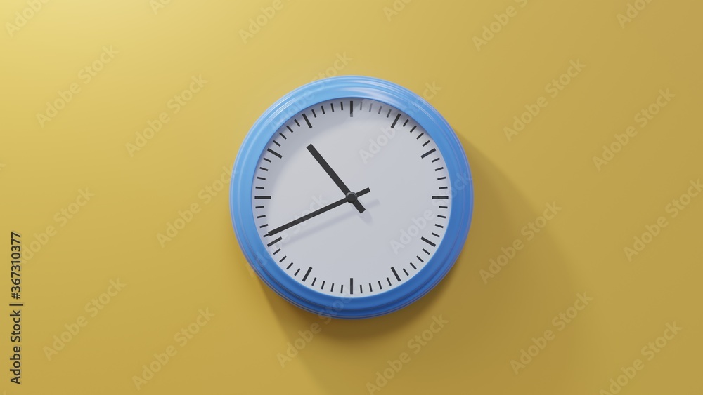 Glossy blue clock on a orange wall at forty-one past ten. Time is 10:41 or 22:41 Glossy blue clock on a orange wall at forty-one past ten. Time is 10:41 or 22:41
