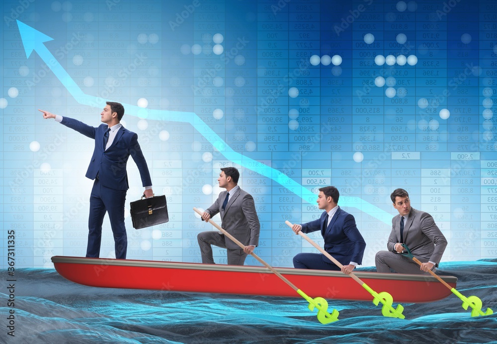 Fototapeta premium Team of businessmen in teamwork concept with boat