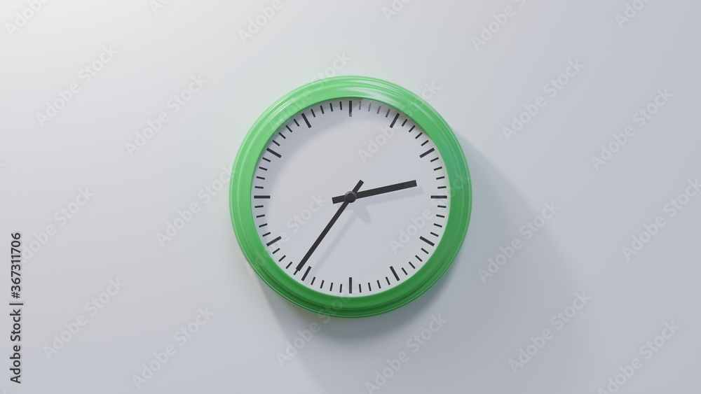 Glossy green clock on a white wall at thirty-six past two. Time is 02:36 or 14:36 Glossy green clock on a white wall at thirty-six past two. Time is 02:36 or 14:36