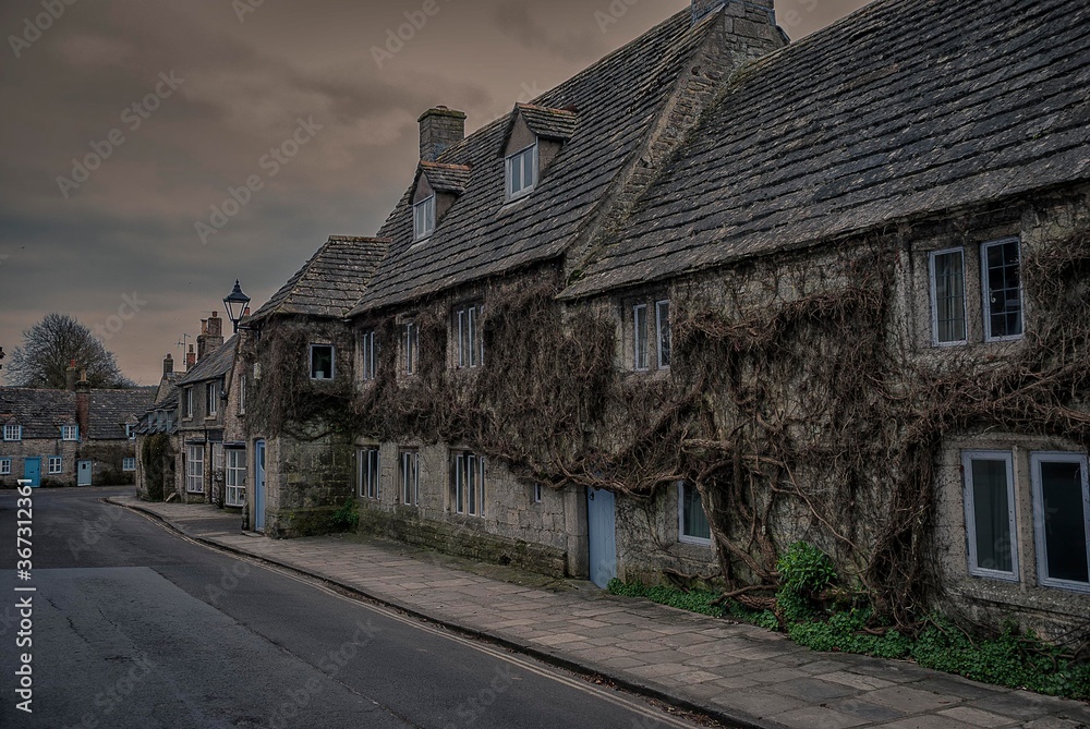 A row of old houses in a village in Dorset, UK A row of old houses in a village in Dorset, UK
