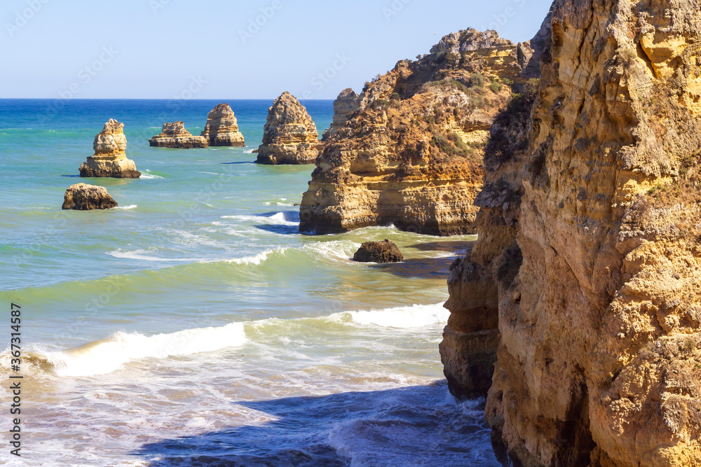 Dona Ana beach rock formations in Lagos, Algarve, Portugal. 