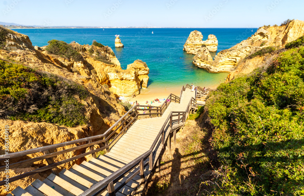 Beautiful scenery of the famous Camilo beach in Algarve, South of Portugal in the end of the day. 