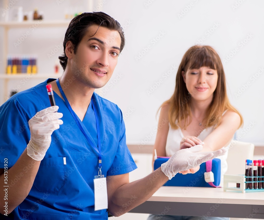 Young patient during blood test sampling procedure Young patient during blood test sampling procedure