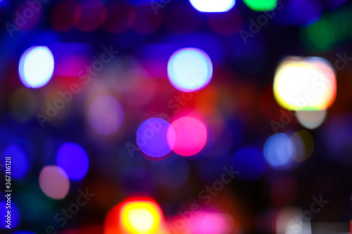 BLURRED AND BOKEH OF LIGHTS AND CHANDELIERS IN LUXURY BAR