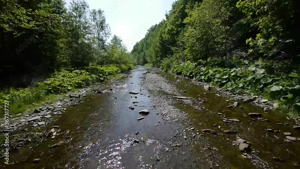Drone Low view Along a Beautiful Rocky Stream In Poland Drone Low view Along a Beautiful Rocky Stream In Poland