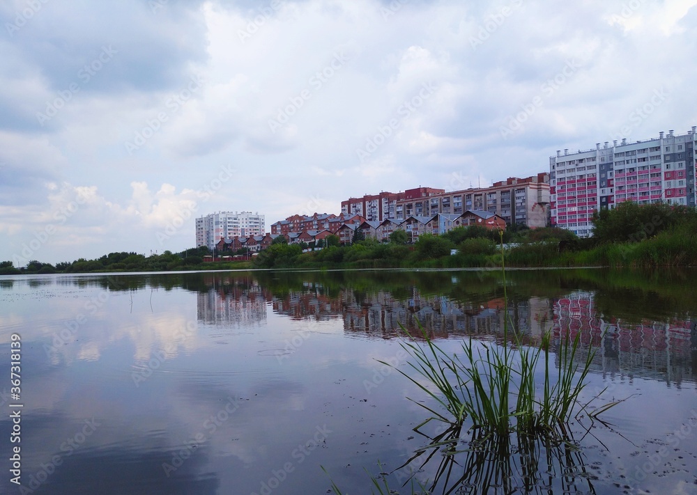 Fototapeta premium reflection of the city in the river