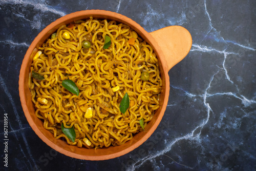 indian instant masala atta noodles with vegetables photo