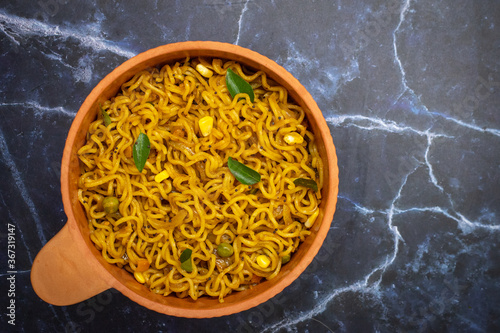 indian instant masala atta noodles with vegetables photo